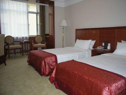 Dong Yuan Business Hotel Yantai Room photo